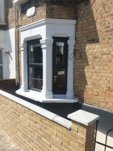 Newly Painted white Door in manchester by UPVC Window Spraying